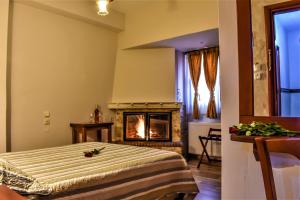 Posteľ alebo postele v izbe v ubytovaní Tasia Mountain Hotel