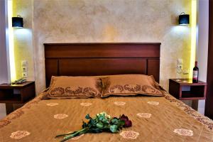 Posteľ alebo postele v izbe v ubytovaní Tasia Mountain Hotel