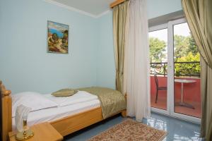 Кровать или кровати в номере Hotel Miramare