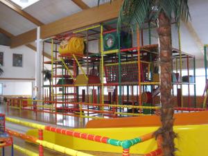 a brightly colored ride in a childrens playground at Appartements im Predigtstuhl Resort in Sankt Englmar