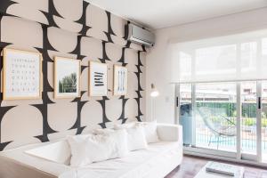 Ένα ή περισσότερα κρεβάτια σε δωμάτιο στο Top Rentals Dorrego +34 φωτογραφίες