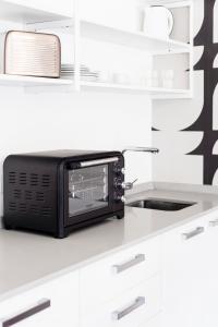 Η κουζίνα ή μικρή κουζίνα στο Top Rentals Dorrego