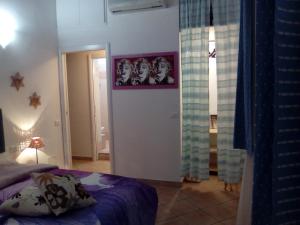 A bed or beds in a room at Sansone