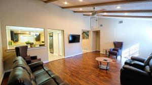 a living room with a couch and chairs at 350k Home, 5 BDR, Up to 16 guest, Middle of Town - Templar in Sugar Land