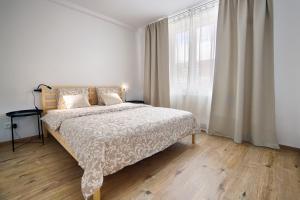 Posteľ alebo postele v izbe v ubytovaní Cvernovka Business&Leisure apartment by Kovee