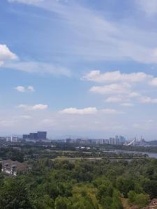 a view of a city with trees and buildings at V’Auliya Residence in Putrajaya