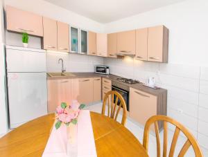 Kuchyň nebo kuchyňský kout v ubytování Apartment Stane