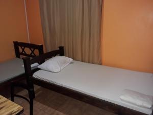 Uma cama ou camas num quarto em Hotel Latino
