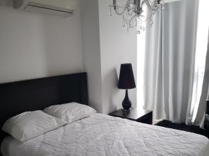 Postel nebo postele na pokoji v ubytování Ibiza Playa Corona