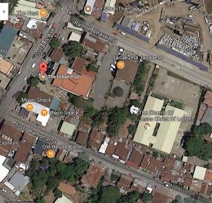 a map of a street with yellow arrows at The Urban Pod Hotel in Cagayan de Oro
