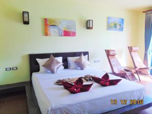 Postel nebo postele na pokoji v ubytování Lanta Amara Resort