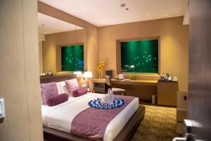 Krevet ili kreveti u jedinici u okviru objekta Hotel H2O