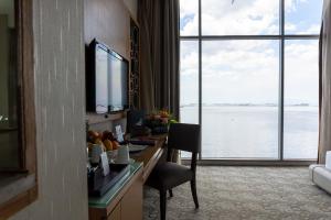 TV i/ili multimedijalni sistem u objektu Hotel H2O