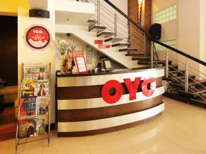 a store with a yes sign in a mall at Super OYO 107 Orange Nest Hotel in Manila