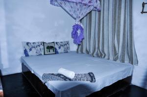 Giường trong phòng chung tại Ath Hala Safari Resort