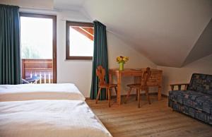 Postel nebo postele na pokoji v ubytování Hotel Feldrand
