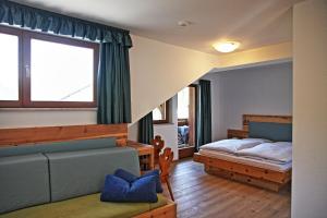 Postel nebo postele na pokoji v ubytování Hotel Feldrand