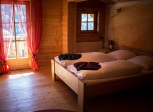 Postel nebo postele na pokoji v ubytování Landhaus Erlzette