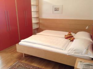 Postel nebo postele na pokoji v ubytování Hotel Figl ***S