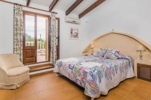 Ein Bett oder Betten in einem Zimmer der Unterkunft Villa Can Boseta by SunVillas Mallorca