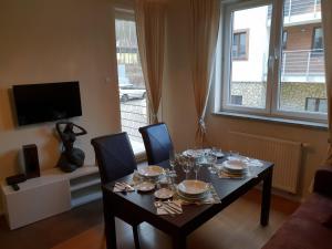 Telewizja i/lub zestaw kina domowego w obiekcie Lux Apartment Art
