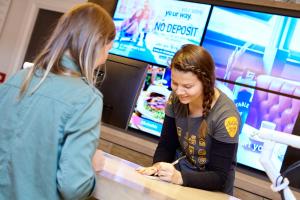 two women standing at a counter in a fast food restaurant at St Christopher's Inn Oasis - London Bridge - Female Only in London