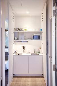 Η κουζίνα ή μικρή κουζίνα στο B&B Park7 Wavre - Leuven