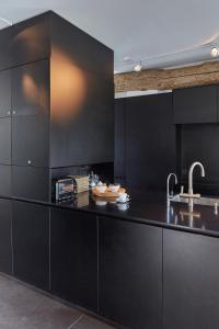 Η κουζίνα ή μικρή κουζίνα στο B&B Park7 Wavre - Leuven