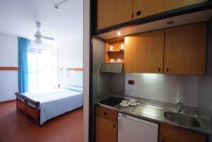 Postel nebo postele na pokoji v ubytování Residence Elite