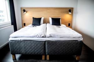 Postel nebo postele na pokoji v ubytování 201 Hotel