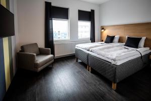 Postel nebo postele na pokoji v ubytování 201 Hotel
