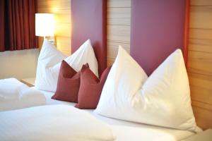 Postel nebo postele na pokoji v ubytování Hotel Sonnschupfer