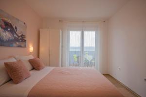 Postel nebo postele na pokoji v ubytování Apartment Petra