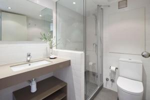 a bathroom with a toilet and a sink and a shower at Amitges by FeelFree Rentals in Baqueira-Beret +11 photos