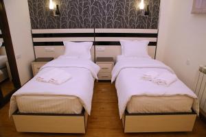 Voodi või voodid majutusasutuse Hotel For You toas