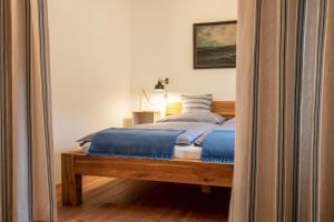 Posteľ alebo postele v izbe v ubytovaní Frauscher Hafen-Apartments