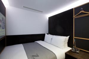 Cama o camas de una habitación en The Z Hotel Covent Garden