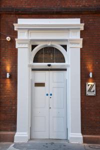 a door to a building with a white door at The Z Hotel Covent Garden in London