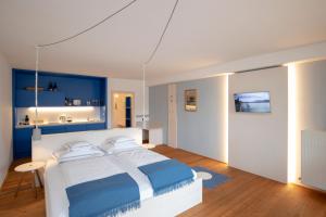 Posteľ alebo postele v izbe v ubytovaní Frauscher Hafen-Apartments