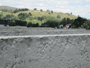 a view from the top of a stone wall at La Casa de Liber in Tandil