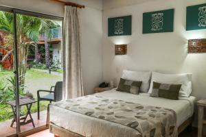 Postel nebo postele na pokoji v ubytování Easter Island Ecolodge