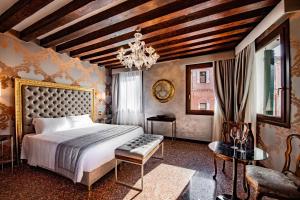 En eller flere senge i et værelse på Palazzo San Lorenzo