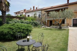 Vonkajšia záhrada v ubytovaní Apartment Cici