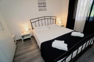 Posteľ alebo postele v izbe v ubytovaní Apartment Cici