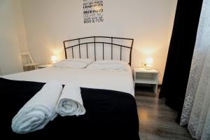 Posteľ alebo postele v izbe v ubytovaní Apartment Cici