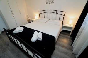 Posteľ alebo postele v izbe v ubytovaní Apartment Cici