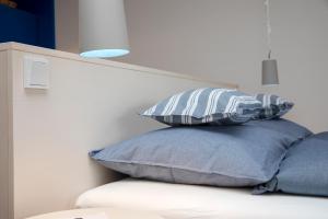 Posteľ alebo postele v izbe v ubytovaní Frauscher Hafen-Apartments