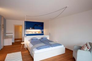 Posteľ alebo postele v izbe v ubytovaní Frauscher Hafen-Apartments