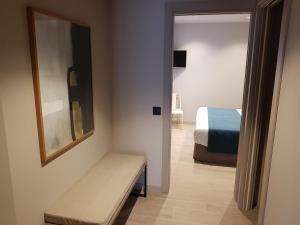 HOTEL TORRENT客房内的一张或多张床位