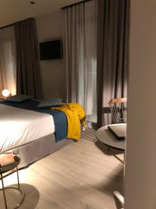 HOTEL TORRENT客房内的一张或多张床位